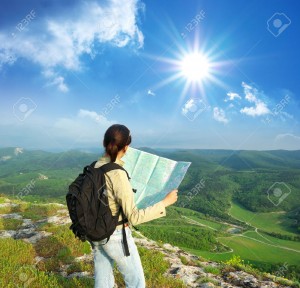 9512680-girl-tourist-in-mountain-read-the-map-map-journey